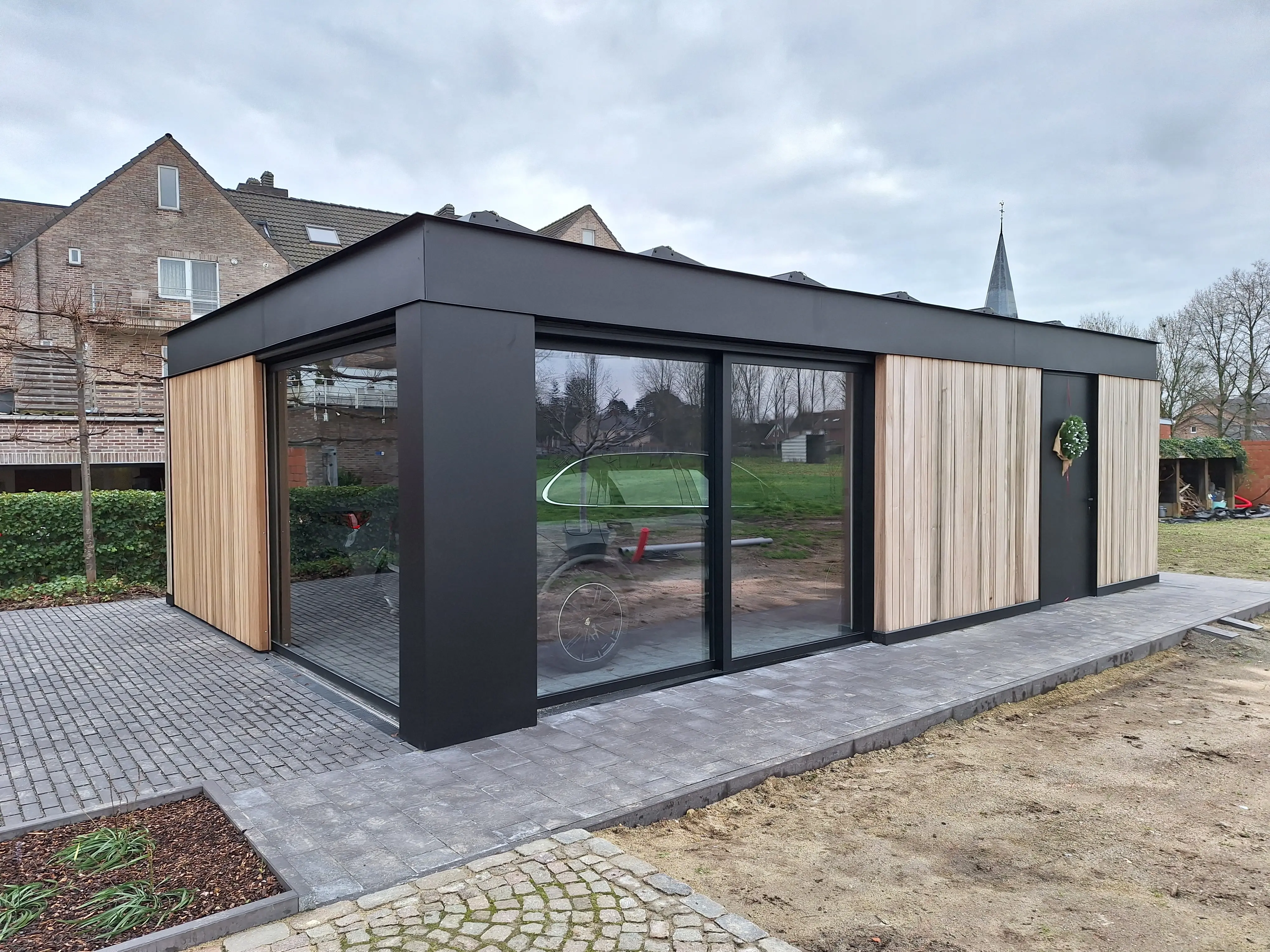 Houtskeletbou carport met aluminium afwerking